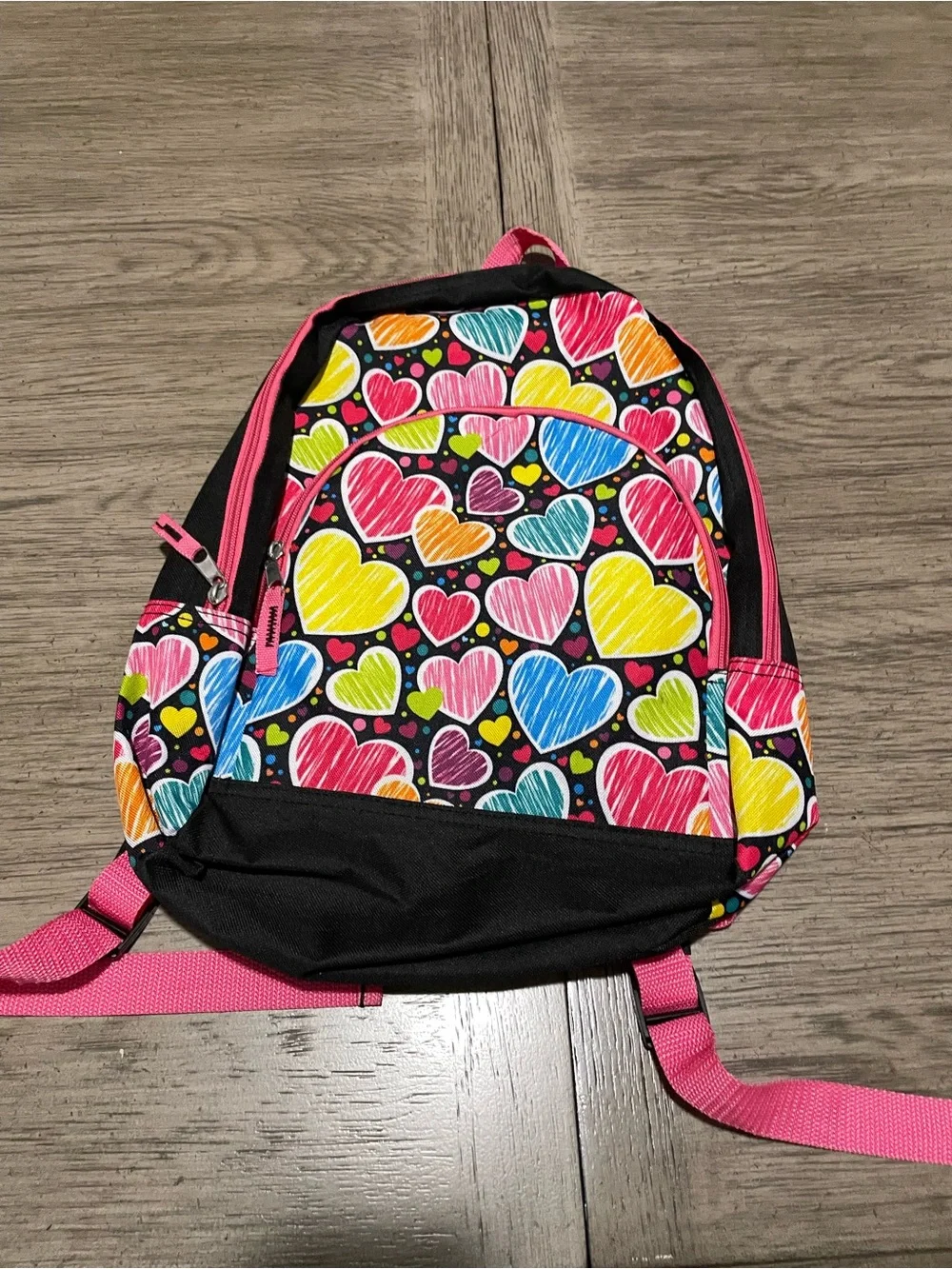 Small backpack, black with multicolored hearts
